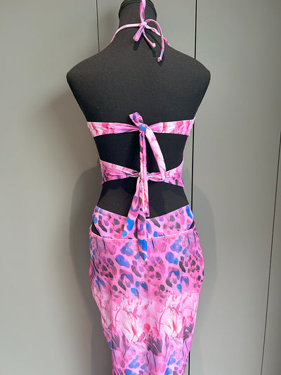 Women's two-piece swimsuit with a halter bikini top and a matching long skirt, featuring a vibrant tropical and animal print. - Image 12