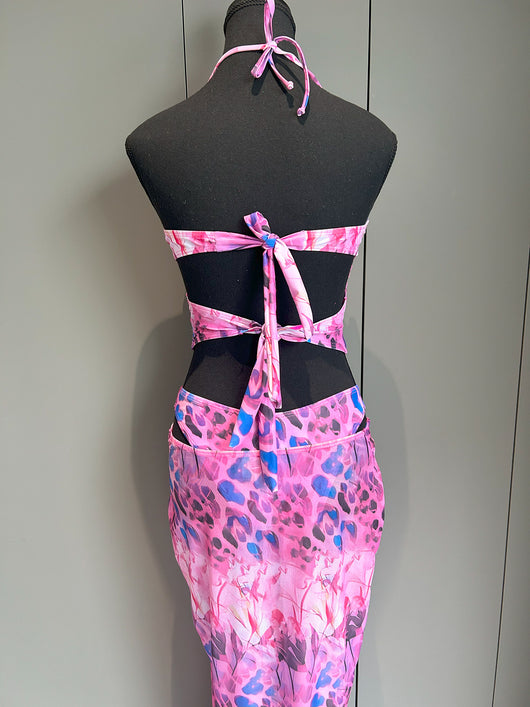 Women's two-piece swimsuit with a halter bikini top and a matching long skirt, featuring a vibrant tropical and animal print. - Image 12