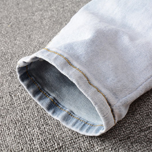 Jeans Azul Claro con Roturas Desgarradas - Image 4