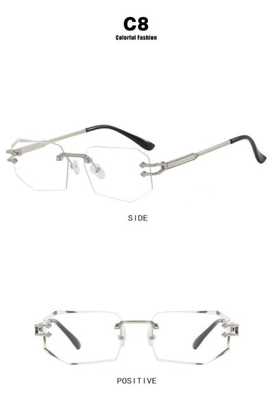 Rimless octagonal clear lens glasses with silver-toned metal temples and black ear tips, featuring decorative accents. - Image 18