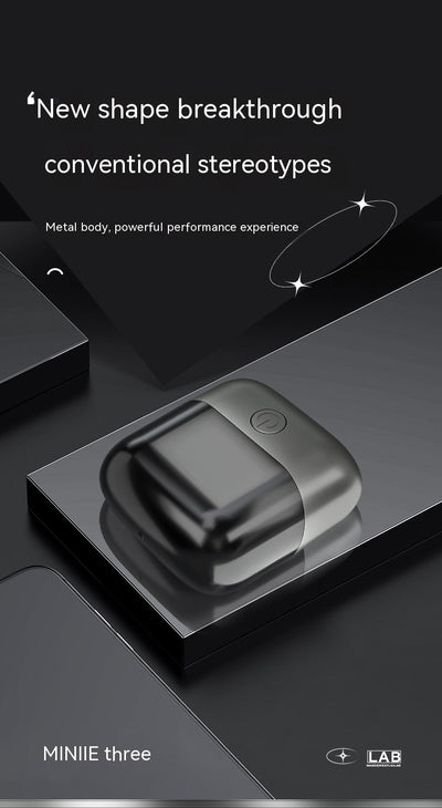Silver mini electric shaver with a double-headed rotary design and a black power button on top. - Image 17