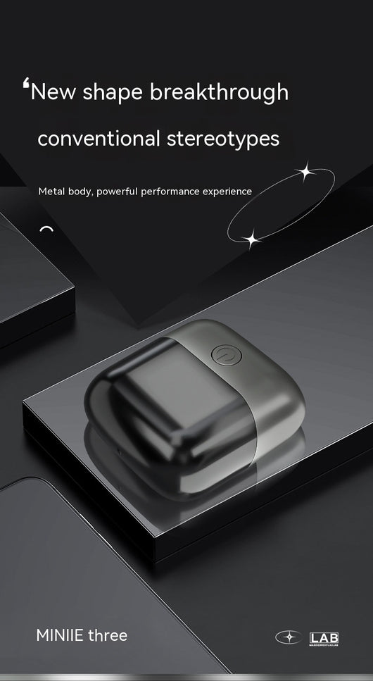 Silver mini electric shaver with a double-headed rotary design and a black power button on top. - Image 17