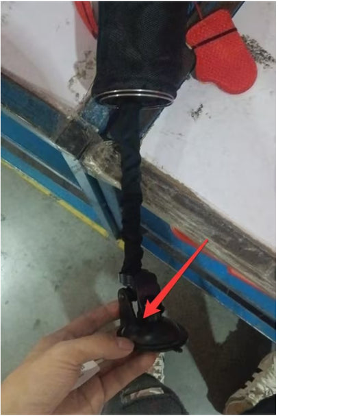 Cat teaser toy with a black elastic cord, mesh bag, and a small red boxing glove, held by a hand showing its suction cup base. - Image 4