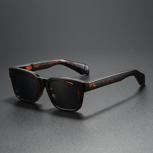 Black square-frame sunglasses with bright orange polarized lenses, designed for outdoor driving and anti-glare. - Image 2