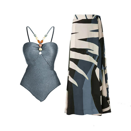 Women's olive green ribbed one-piece swimsuit with colorful beaded straps and matching abstract print sarong skirt. - Image 3