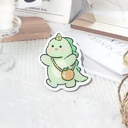 Cute green cartoon dinosaur acrylic badge brooch with a shy expression and small spikes on its back. - Image 4