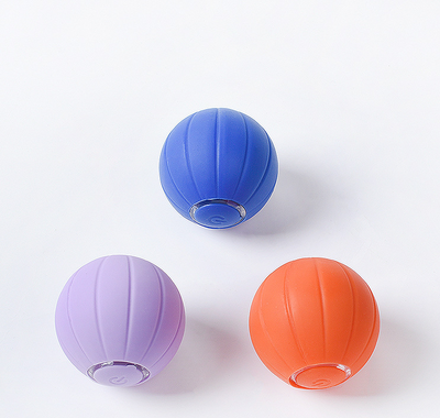 Orange smart bouncing rolling silicone ball toy for cats, shown with its white packaging box and a white USB charging cable. - Image 16