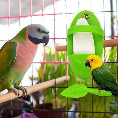 Bright green plastic bird food rack with a lower tray and a leaf-shaped perch, designed for cuttlefish. - Image 7