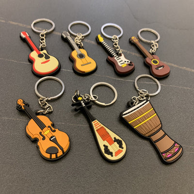 Llavero Guitarra de Silicona - Accesorio Musical Versátil - Image 29