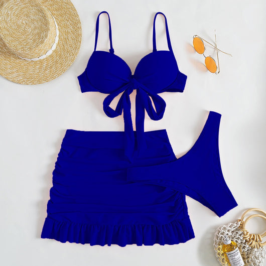 Light blue three-piece women's swimsuit with a bow-front bikini top, ruched mini skirt, and matching bottoms. - Image 8