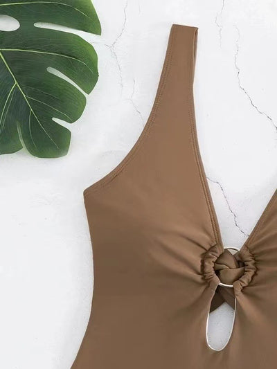 Women's lavender one-piece swimsuit with a deep V-neck, silver O-ring detail, and a keyhole cutout at the bust. - Image 14