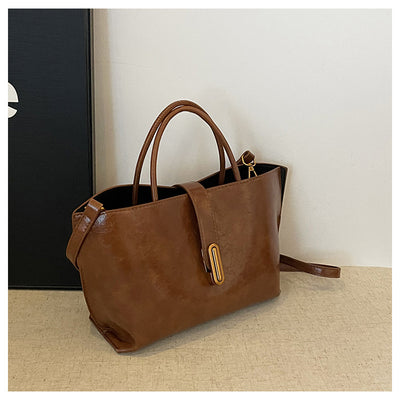 Bolso Bucket de Cuero Encerado Elegante y Portátil - Image 50