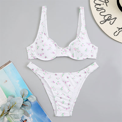 Light blue floral bikini with pink and yellow flowers, featuring an underwire top and high-cut bottom. - Image 3