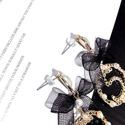 Aretes Circulares Dorados con Perla y Moño - Diseño Elegante y Trendy - Image 8