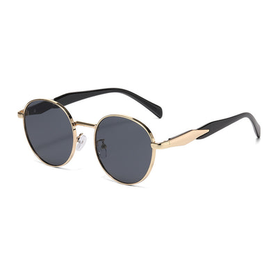 Silver metal round frame sunglasses with dark grey lenses and black temples, offering UV protection for women. - Image 3