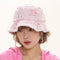 Gorra Bucket Denim Estampado Total con Bordes Crudos Versátil