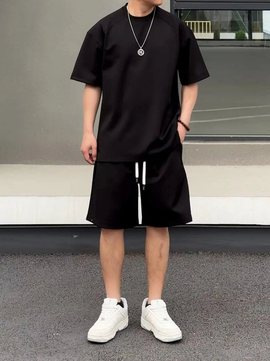 Khaki men's short-sleeved t-shirt and matching shorts set, featuring a loose fit and white drawstring. - Image 3