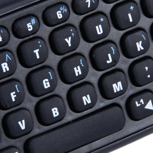 Black wireless keyboard attachment for PS4 game controller, featuring a full QWERTY layout and 3.5mm audio jack. - Image 13