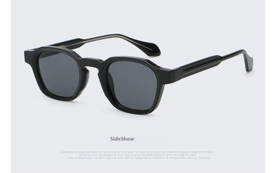 Classic fashion sunglasses with a black and tortoiseshell quadrilateral frame and dark green lenses, angled view. - Image 12