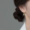 Aretes de Jade Hetian Verde con Plata - Diseño Minimalista Elegante