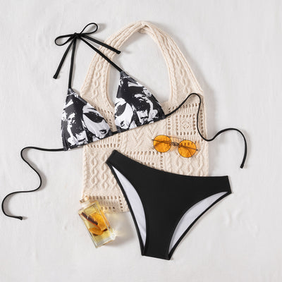 Black and white printed triangular cup tie bikini top with solid black bottoms, displayed with a knit tote bag and sunglasses.