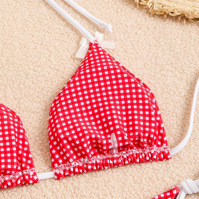 Blue and white gingham plaid bikini swimsuit with triangle top and thong bottom, featuring white tie straps and bows. - Image 59