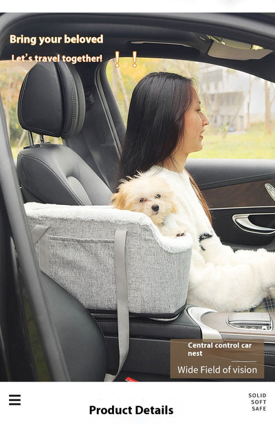 Grey pet car seat with plush white lining, designed for small dogs or cats, placed on a car's center console. - Image 16
