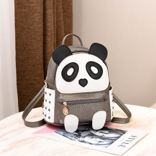 Metallic gold and white cartoon panda backpack with black ears and eye patches, a heart nose, and studded side panels. - Image 12