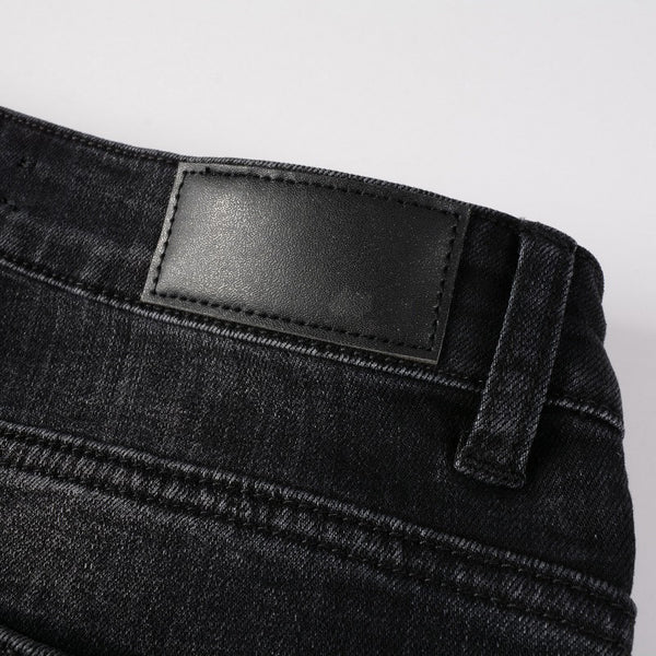 Jeans Slim Ajustado con Detalles Rotos