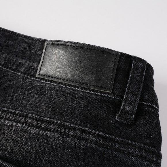 Jeans Slim Ajustado con Detalles Rotos