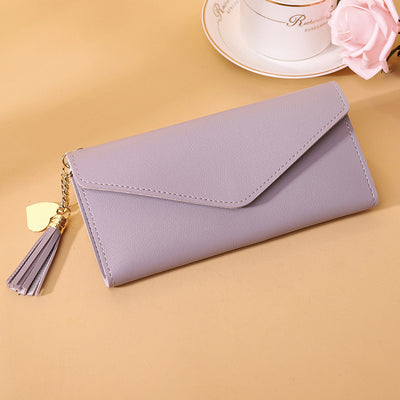 Bolso de mano con borlas decorativas - Image 15