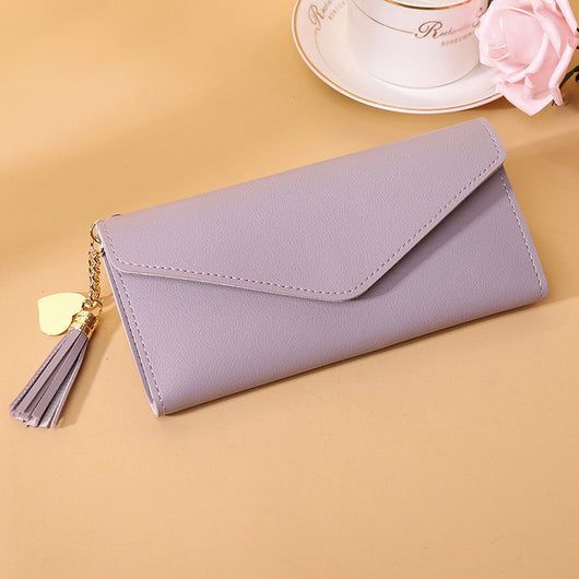 Bolso de mano con borlas decorativas - Image 15