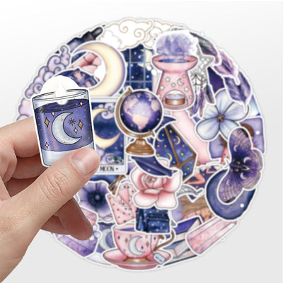 50-piece pack of mystical graffiti stickers featuring moons, stars, tarot cards, crystals, and butterflies in purple, pink, and blue. - Image 3