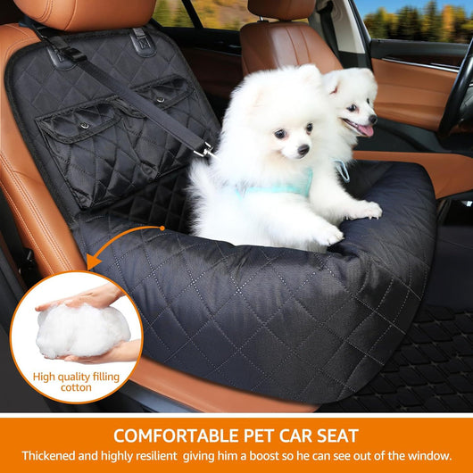Black quilted pet car seat protector with two happy white fluffy dogs, secured to a brown leather car seat.