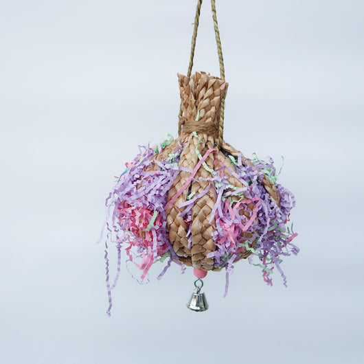 Woven straw paper parrot toy filled with colorful shredded paper, featuring a small bell at the bottom. - Image 3