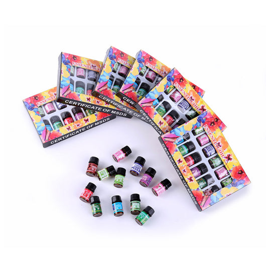 Set of 12 water-soluble aromatherapy essential oils in small bottles, including lemon, lavender, rose, and jasmine. - Image 8