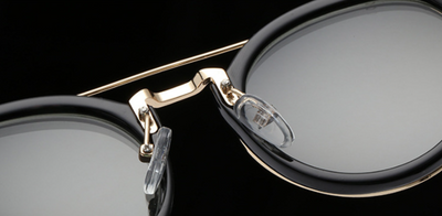 Round frame sunglasses with light blue mirrored lenses and a gold-tone metal frame, featuring a double bridge. - Image 18