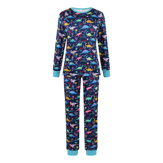 Matching family Christmas pajamas in green with a festive pattern of Santa, reindeer, and Christmas trees. - Image 13
