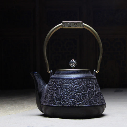 Tetera Portátil de Hierro para Té y Agua Caliente