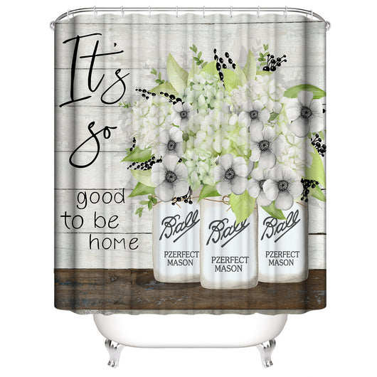 White shower curtain with a vibrant green botanical leaf print, hanging in a bright, modern bathroom. - Image 5