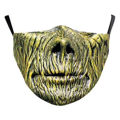 Green and yellow digital print Halloween dust mask with a grotesque, tree-like face design and black ear loops. - Image 6