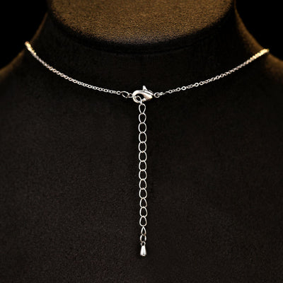 Elegant jewelry set with a silver-tone necklace and matching stud earrings, featuring blue and clear floral gemstones. - Image 10