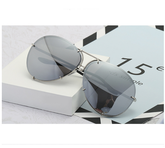 Aviator sunglasses with light blue lenses and a gold-colored metal frame, featuring a double bridge design. - Image 17