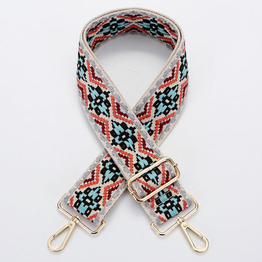 Yellow and white ethnic style patterned canvas bag strap with gold-toned adjustable buckle and swivel snap hooks. - Image 4