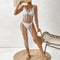 Vestido Playero Elegante con Detalles Calados y Abalorios