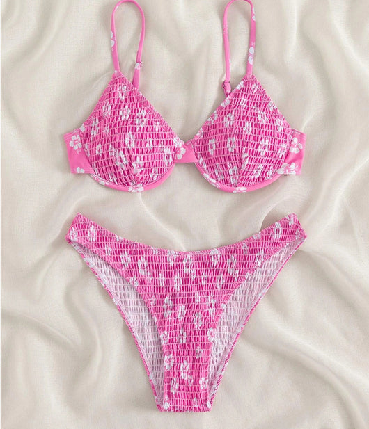 Periwinkle blue two-piece swimsuit with white floral pattern and ruched texture, featuring an underwire bikini top and high-cut bottoms. - Image 19