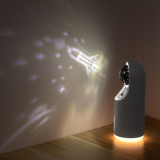 White and dark gray mini wireless ultrasonic humidifier and essential oil diffuser with an illuminated LED night lamp. - Image 9