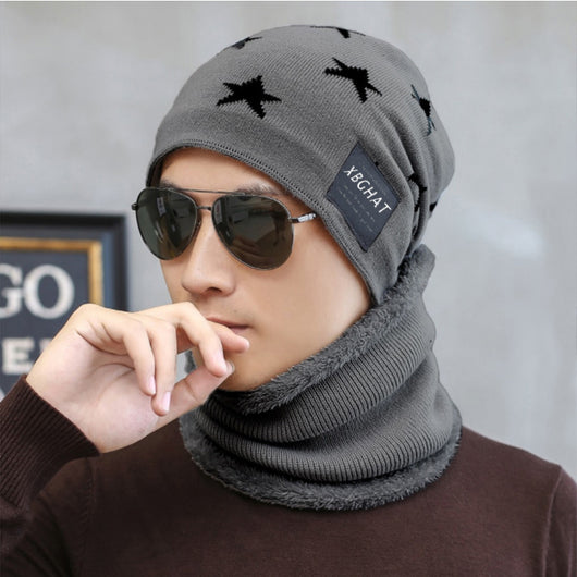 Brown knitted beanie with white five-pointed stars and a matching fleece-lined neck warmer on a man. - Image 7