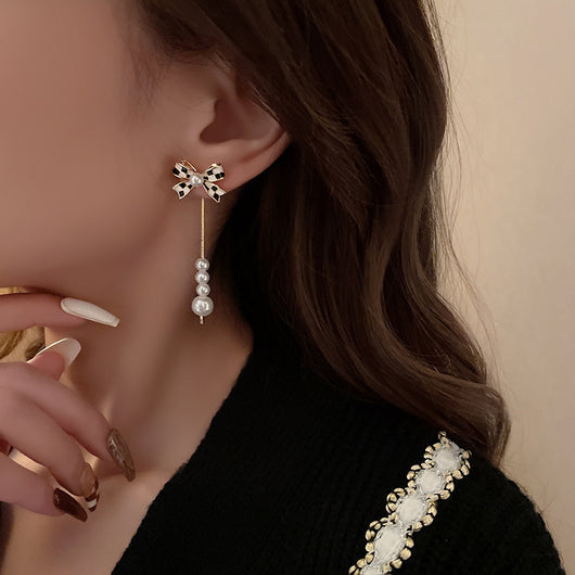 Aretes de Perla con Moño Elegante para Mujer - Image 9