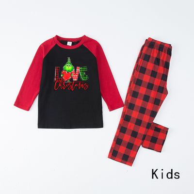 Kids' Christmas pajama set with black and red raglan top featuring a 'LOVE Christmas' graphic and plaid pants. - Image 5